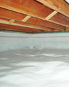 a moisture barrier installed on the walls and floors of a crawl space in West Columbia