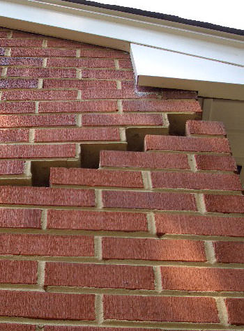photo of a rotating foundation wall with cracks in Clemson