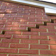 stair step cracking on a foundation wall in Greenville