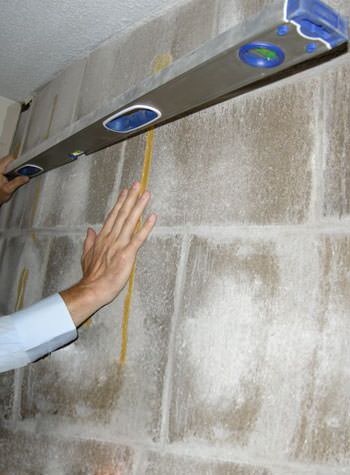 severe foundation wall failure symptoms of a basement wall in Brevard