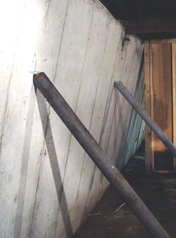A foundation wall leaning in at the top in Belton