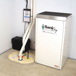 Sump pump system, dehumidifier, and basement wall panels installed during a sump pump installation in Taylors