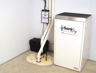a complete basement waterproofing system installed in a Greenville home