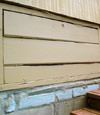 an old-fashioned crawl space door in Laurens about to be replaced