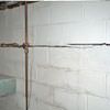 Severe foundation damage from a long crack in a bucking wall of a Seneca home.