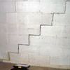 A diagonal stair step crack along the foundation wall of a Inman home