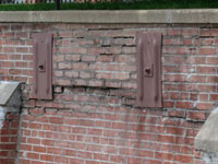 A collapsing, crumbling retaining wall in Franklin