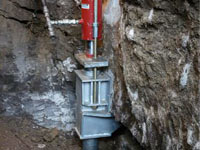 Foundation repair contractors lifting a structure in Greenville.