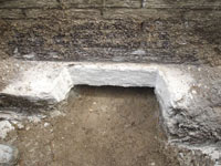 Preparing a foundation footing for helical pier installation in Lexington