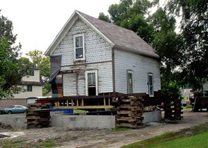 A severely damaged home foundation that is undergoing replacement in Chester.