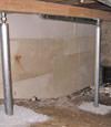 A system of crawl space support posts adding structural support to a crawl space in Clemson