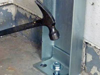 Mounting a foundation channel anchor installation to the floor in Greer.