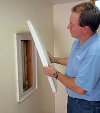 wall anchor covers installed in a foundation repair for a Candler home.