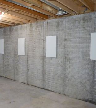 Wall anchor covers covering a foundation wall repair system in Simpsonville, West Columbia, Taylors, Seneca, Waynesville
