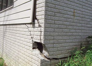 A severely damaged foundation wall in Easley