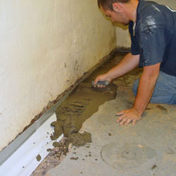 Testing a French drain system in a Simpsonville home.