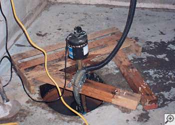 A Waynesville sump pump system that failed and lead to a basement flood.