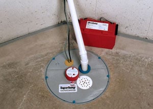A sump pump system with a battery backup system installed in Laurens