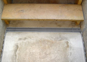 Our grated drain system installed on a leaking basement staircase in Pickens.