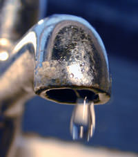 A closeup of a faucet