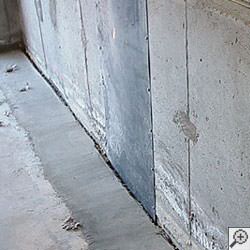 an ugly basement weeping tile drainage system that's clogged and not working in Anderson.