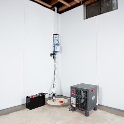 Sump pump system, dehumidifier, and basement wall panels installed during a sump pump installation in Seneca