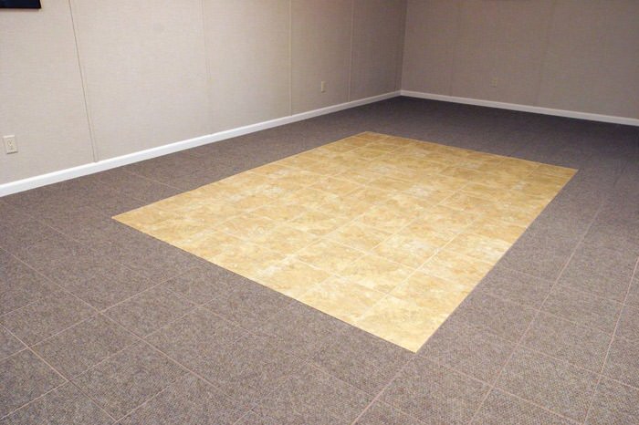 tiled and carpeted basement flooring installed in a Columbia home