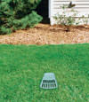 A buried gutter drain downspout extension installed in a Clemson home