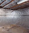 An energy efficient radiant heat and vapor barrier for a Newberry basement finishing project