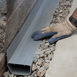 installing a drain tile system in a Toccoa home
